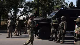 2025-10-04T230133Z-1632177278-RC255HAY3BHY-RTRMADP-3-USA-TRUMP-CHICAGO